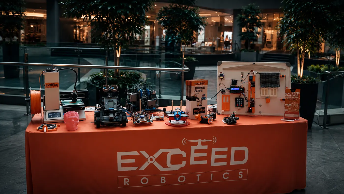 Advanced robotics lab environment without people, rendered in dark enterprise tones